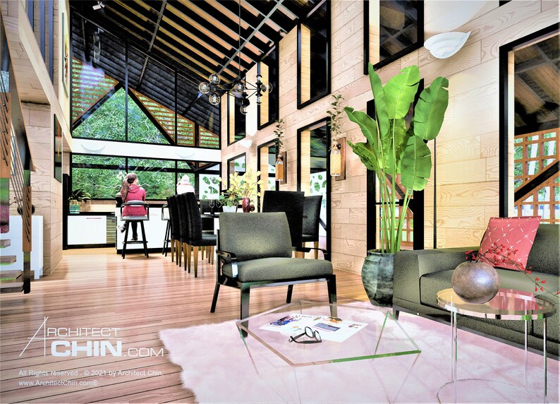 May include: A modern living room with a large window overlooking a green forest. The room features a green sofa, a glass coffee table, a green armchair, and a pink rug. The room is decorated with plants and a black and white print on the coffee table.