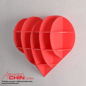 Pu&ograve; includere: Un ripiano a muro a forma di cuore rosso vivo con pi&ugrave; ripiani. Il ripiano &egrave; in legno e ha un design moderno.
