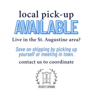 May include: Blue text on a white background reads "local pick-up AVAILABLE". Below the text is "Live in the St. Augustine area? Save on shipping by picking up yourself or meeting in town. contact us to coordinate". A black and white illustration of a cupboard with a wreath around it is at the bottom of the image. The text "THE DUSTY CUPBOARD" is below the illustration.