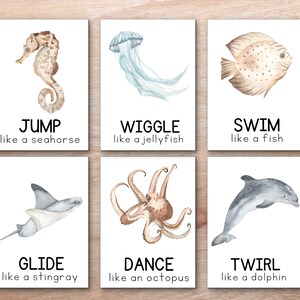 May include: Six illustrated cards with watercolor images of sea creatures and action verbs. The cards feature a seahorse, jellyfish, fish, stingray, octopus, and dolphin. Each card has a verb and a phrase describing how the animal moves, such as "Jump like a seahorse" and "Swim like a fish."