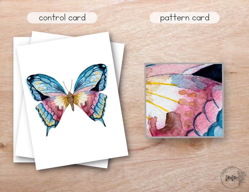 May include: A watercolor painting of a butterfly with blue, pink, and yellow wings. The butterfly is on a white background. The image is a control card for a pattern.
