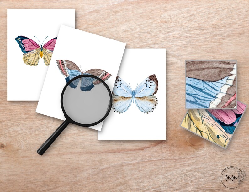 May include: Three printable art prints featuring watercolor illustrations of butterflies. The butterflies are in shades of pink, blue, and brown. The prints are on white paper and are ready to be framed.