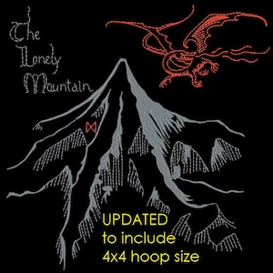 May include: Black background with a gray mountain range design, a red dragon, and the text "The Lonely Mountain." The text "UPDATED to include 4x4 hoop size" is also present. The design is likely for embroidery or a similar craft.
