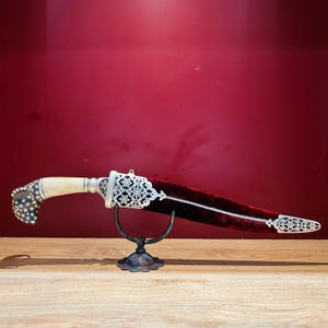 Indian assorted dagger/khanjar/knife in silver damascening with animal figure hand grip & damascus blade