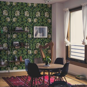 May include: A dining room with a green floral wallpaper, a wooden table with four black chairs, a harp, and a large window with white curtains.