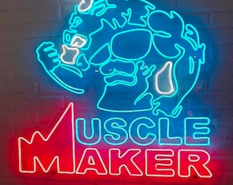 May include: Neon sign featuring a blue outline of a muscular figure flexing, with the words "Muscle Maker" in red neon.