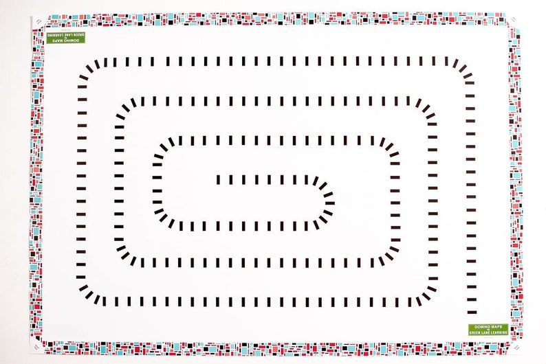 May include: A rectangular white game mat featuring a central black spiral pattern made of small rectangles. The border consists of a mosaic of tiny red, black, and light blue squares. The text "DOMINO MAPS GREEN LANE LEARNING" is printed in green.