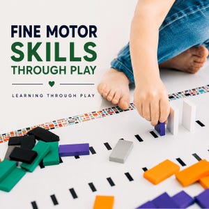May include: A set of colorful rectangular wooden blocks used for stacking and play, arranged on a white surface with black markings. The text FINE MOTOR SKILLS THROUGH PLAY and LEARNING THROUGH PLAY is visible in the upper left corner of the image.