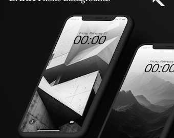 May include: Two black and white phone mockups with different backgrounds. The first phone shows a black and white image of a concrete building with the time 00:00 displayed on the screen. The second phone shows a black and white image of mountains with the time 00:00 displayed on the screen.