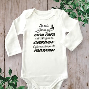 Personalized unisex baby bodysuits I am proof that MY DAD is not always in the GARAGE and that he takes care a little of mom Noir