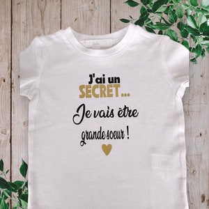 Bodies Bodysuit or unisex baby t-shirt ideal for Announcing a pregnancy I have a SECRET I'm going to be a big sister or big brother, cousin... OR