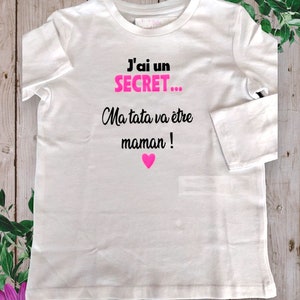 Bodysuits Bodysuit or unisex baby t-shirt to announce a pregnancy I have a SECRET my godmother is going to be a Mom or other word of your choice Rose Fluo