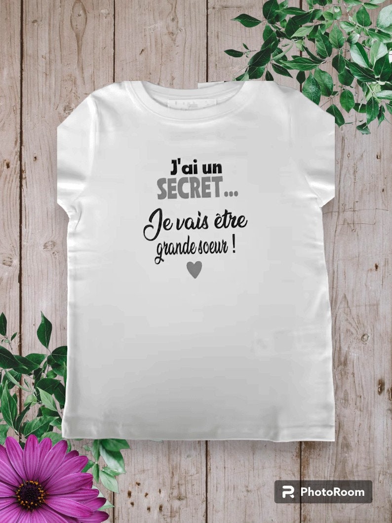 Bodies Bodysuit or unisex baby t-shirt ideal for Announcing a pregnancy I have a SECRET I'm going to be a big sister or big brother, cousin... Gris