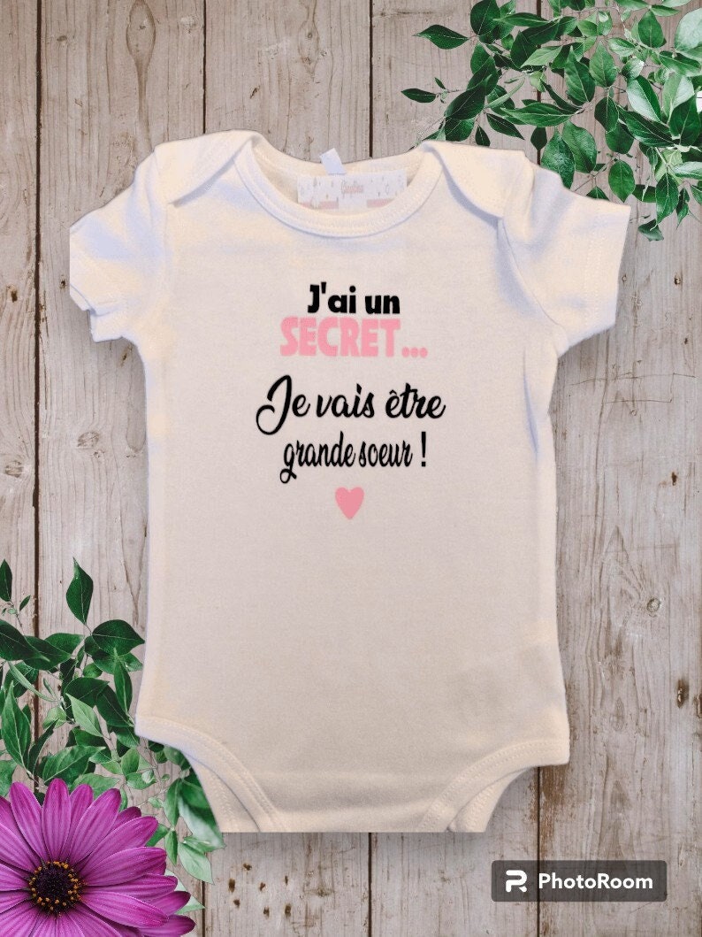 Bodies Bodysuit or unisex baby t-shirt ideal for Announcing a pregnancy I have a SECRET I'm going to be a big sister or big brother, cousin... Rose claire