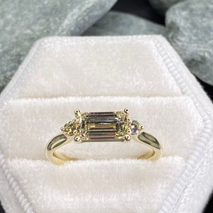 Baguette cut diamond ring, 14K yellow gold engagement ring