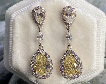 Fancy yellow Dangle Earrings, diamonds earrings, pear shape cut.