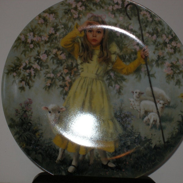 Collectible porcelain plate depicting Little Bo Peep and her shop from the famous nursery rhyme  Mother Goose series by John McClelland