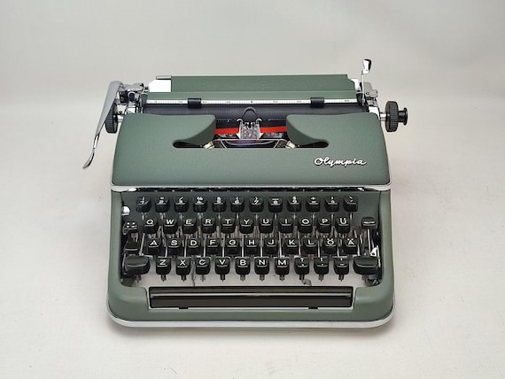 新登場*!Qwerty配列のOlympia SM3タイプライター、ポータブル 新登場*!Qwerty配列のOlympia SM3タイプライター、ポータブル