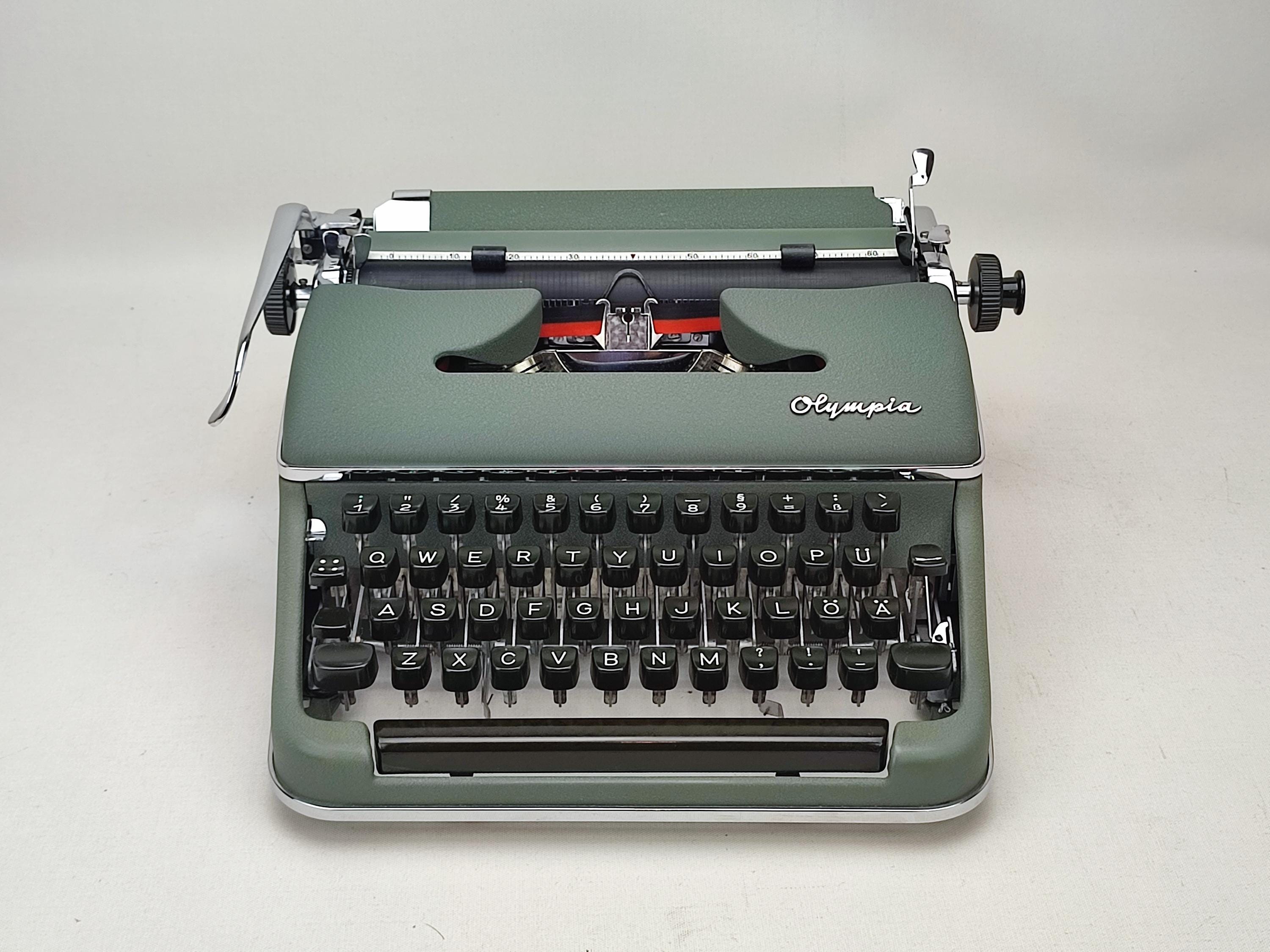 Olympia Model SM タイプライター il_fullxfull.6359938490_3s4m.jpg