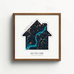 May include: A framed print with a white house outline filled with a map of Philadelphia, Pennsylvania. The text "OUR FIRST HOME" is below the map with the coordinates 39.9526&deg; N 75.1652&deg; W.