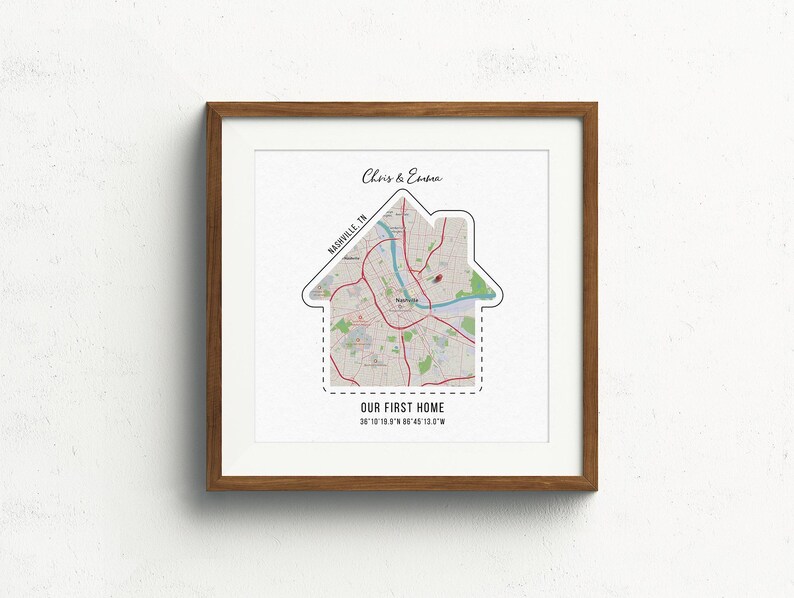 May include: A framed print with a map of Nashville, Tennessee, shaped like a house. The text "Chris & Ember" and "Our First Home" is printed below the map.