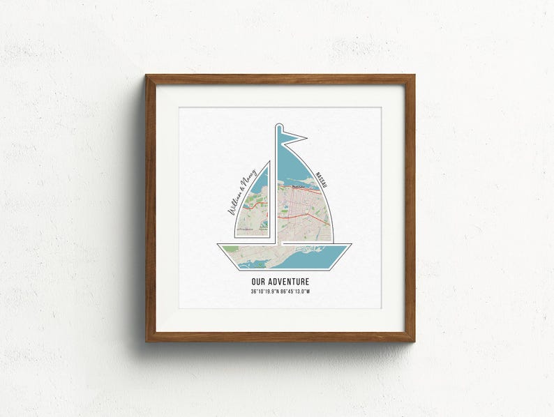 May include: A framed print of a sailboat with a map of a city inside. The text "Our Adventure" is below the map, and the text "William & Mary" is on the left side of the map.