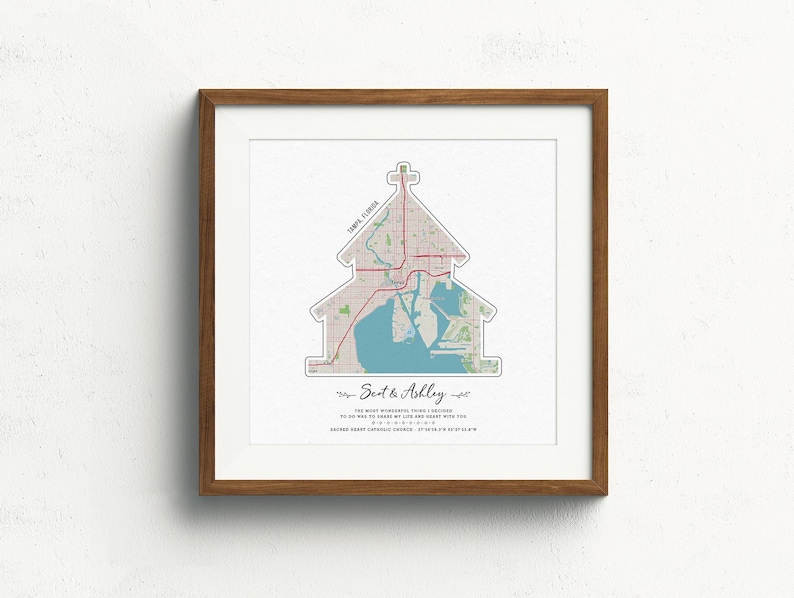 May include: A framed print of a map of Tampa, Florida, shaped like a house. The text "Scott & Ashley" is printed below the map.