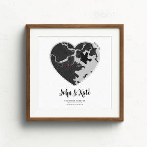 May include: A black and white map of Boston, MA in the shape of a heart with the text "John & Kate Together Forever" below the map.