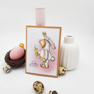 Osterkarte handgemacht,  mit Bären im Osterhasenkostüm, handkoloriert, Klappkarte mit Umschlag