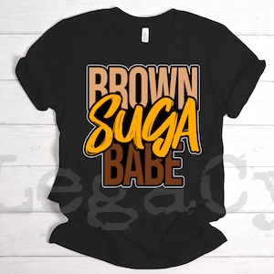 May include: Black t-shirt with the text "BROWN SUGA BABE" in yellow, orange, and brown lettering.