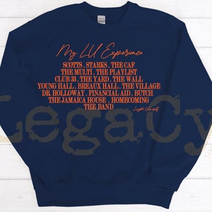 May include: Navy blue sweatshirt with the text "My LU Experience" in orange. The text lists various locations and activities associated with a university, including "Scotts", "Starks", "The Caf", "The Multi", "The Playlist", "Club 33", "The Yard", "The Wall", "Young Hall", "Breaux Hall", "The Village", "Dr. Holloway", "Financial Aid", "Butch", "The Jamaica House", "Homecoming", and "The Band". The text "Legacy" is also visible in orange.