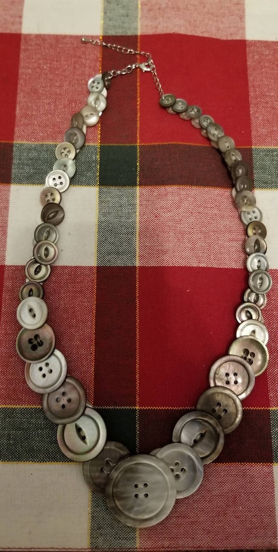 100 year old mother of pearl button necklace.