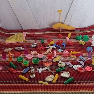 Large lot of Vintage Gumball Machine and Cracker Jack Plastic Toys.