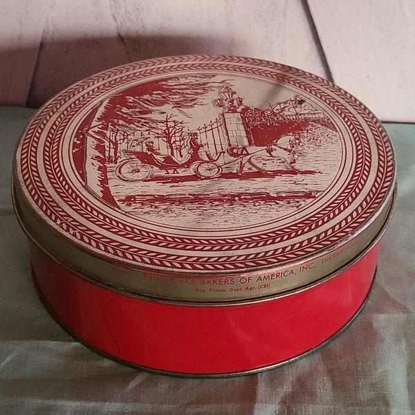 Vintage Decorative Tin with a horse and Buggy on the lid.