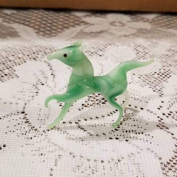 Jade colored glass horse.