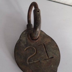 Vintage metal animal tag.