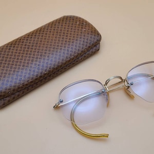 Vintage eyeglasses with case.