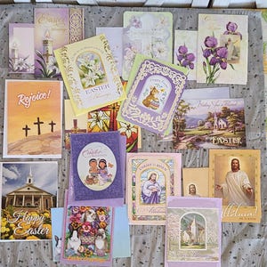 May include: A collection of Easter greeting cards with various designs. Some cards feature religious imagery like crosses, churches, and Jesus. Others display floral arrangements, bunnies, and the words "Easter Blessings," "Happy Easter," and "Rejoice!"