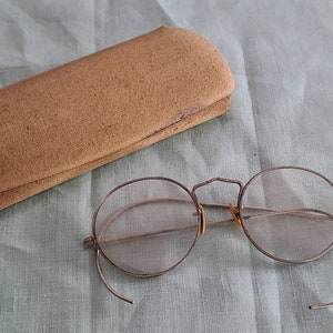 Vintage eyeglasses with case.