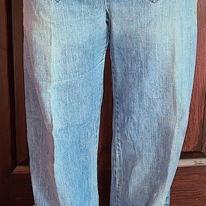 Vintage Bell Bottom jeans, with Really cute double zipper in the front. Size 13. image 1