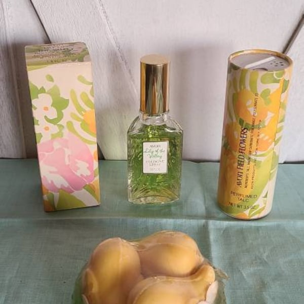 Vintage Avon Lily of the Valley Perfume, Field Flowers Talc, and Love Nest Green Glass Soap Dish and 3 bird shaped soaps.
