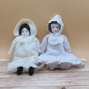 Pair of Vintage Porcelain Dolls