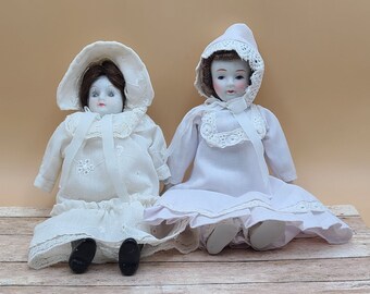 Pair of Vintage Porcelain Dolls