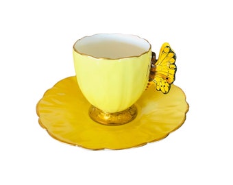 Very Rare collectible 1930’s Aynsley yellow butterfly handle demitasse cup and saucer No 765788 England, mint condition.