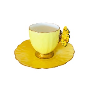 Very Rare collectible 1930’s Aynsley yellow butterfly handle demitasse cup and saucer No 765788 England, mint condition.