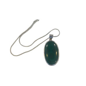 Vintage large 925 sterling silver Italy oval pendant with green stone and Italy sterling silver chain .