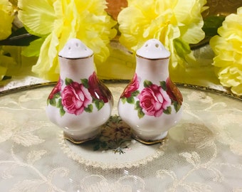 A pair of vintage Royal Albert “Old English Rose“ pattern salt and pepper shakers England. Beautiful pink roses gift for her.