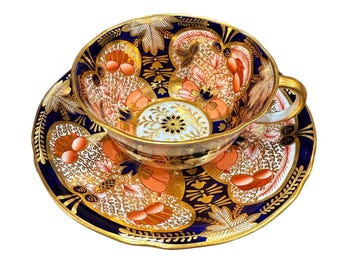 Rare royal crown derby pattern 4971 Imari tea cup and saucer, collectible English bone China