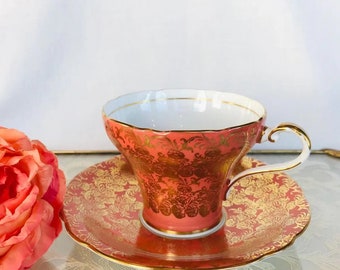 Aynsley corset orange and gold tea cup and saucer, corset shaped teacup