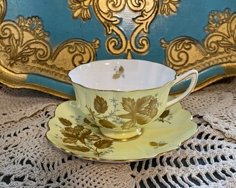 Vintage Shelley light yellow tea cup and saucer with gold roses pattern, Shelley collectible collector bone china, gift for her
